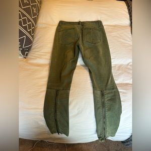 Free people green pants with zipper on back.